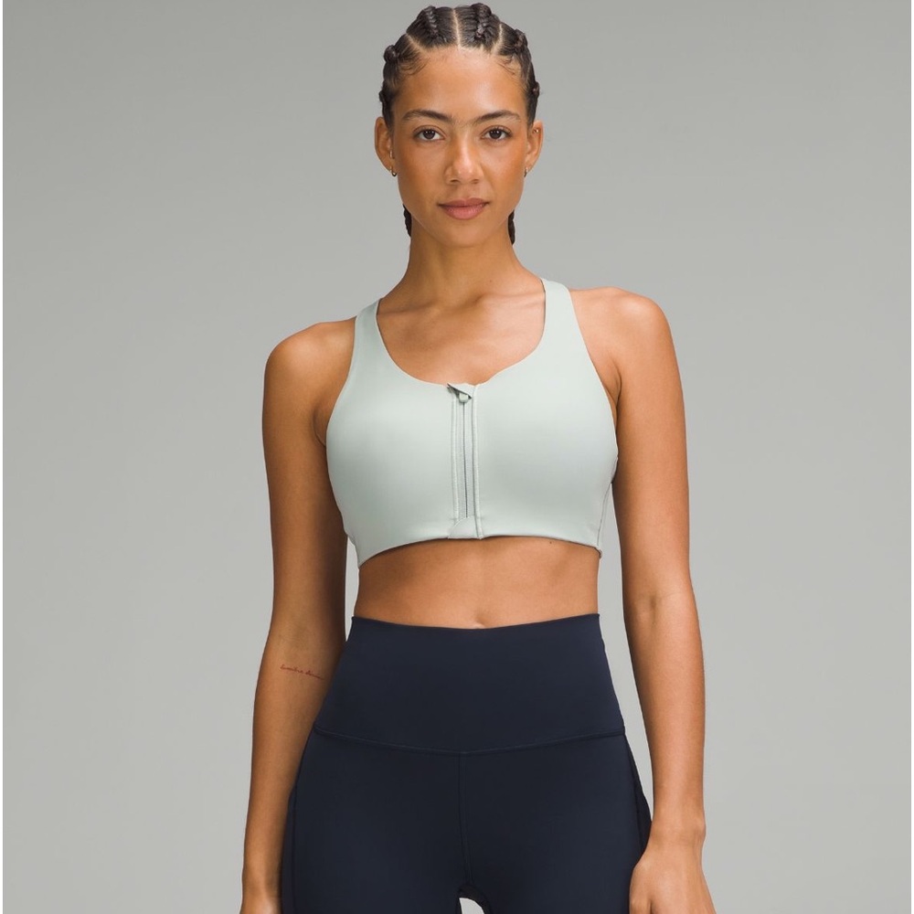Lululemon Energy zip-close medium support sports bra in coral kiss, size 34C